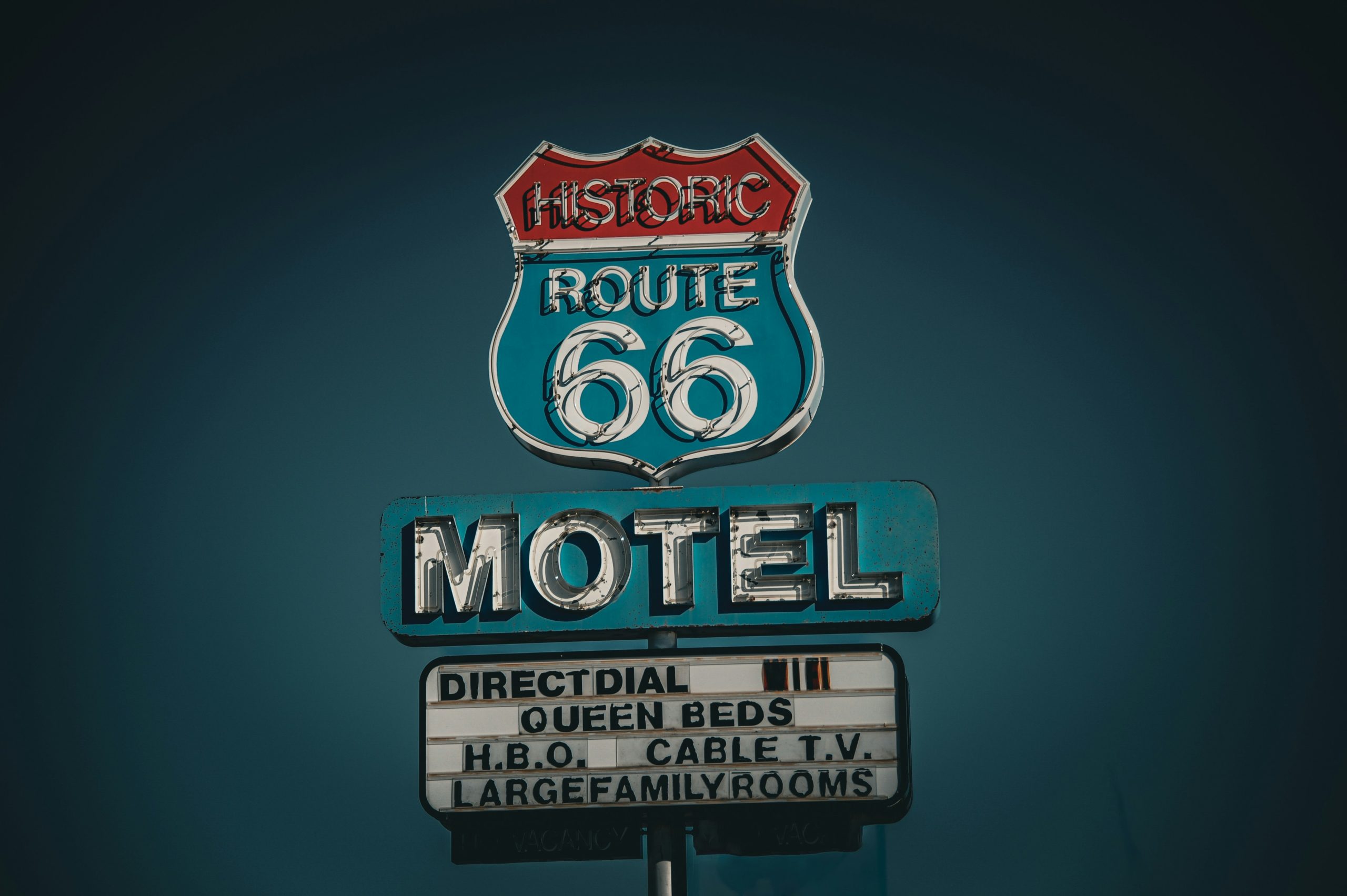 A vintage roadside motel sign on Route 66, similar to Pink Motel Sun Valley Jose Mier